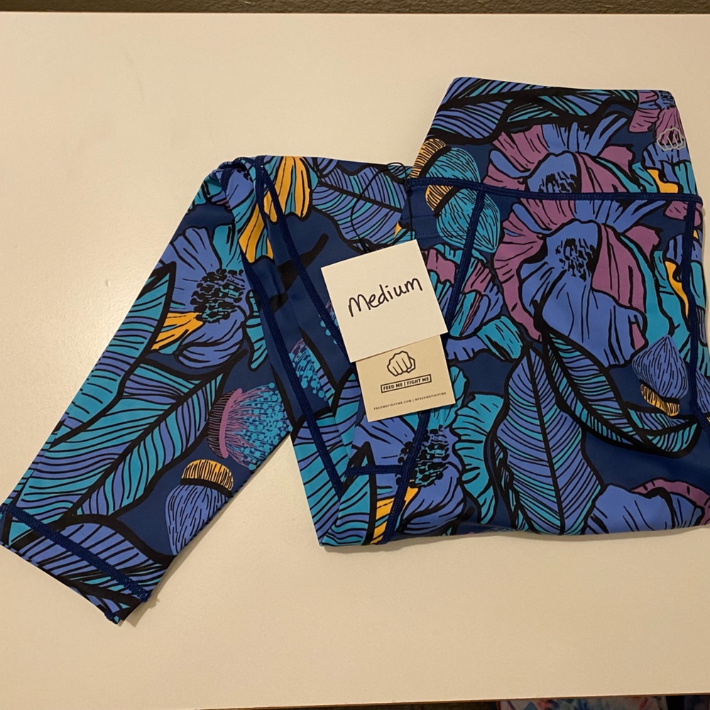 Feed Me Fight Me leggings - Med - NWT